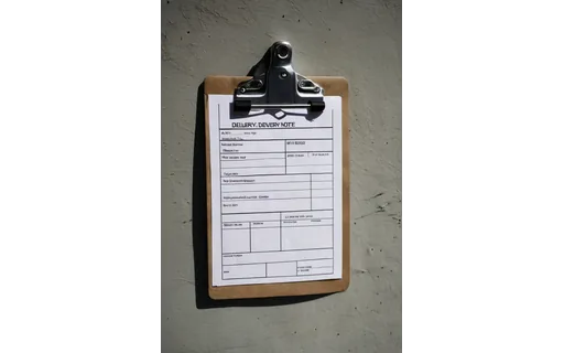 Preview of A delivery note on a clipboard (lossless PNG)