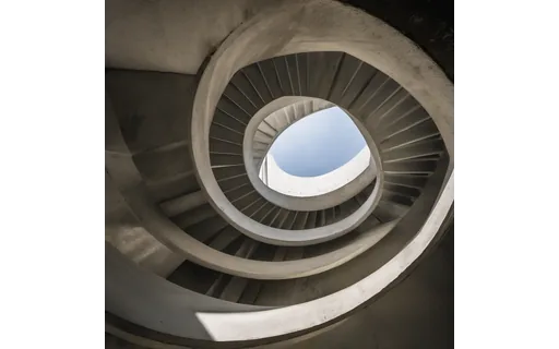 Preview of Concrete spiral stairwell seen (WebP q85)